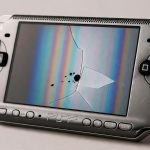 PSP con pantalla rota, líneas de colores y carcasa desgastada necesita arreglo de PSP en Chía, Cundinamarca